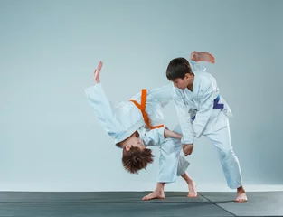 Foto op Aluminium The two boys fighting at Aikido training in martial arts school. Healthy lifestyle and sports concept © master1305