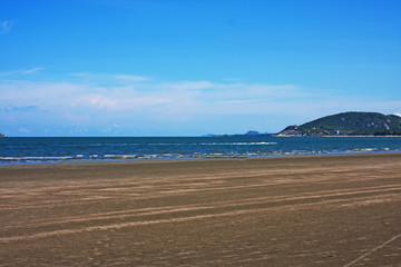 Sea view from tropical beach with sunny blue sky
