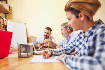 Team job. Photo young businessmans working with new project in office