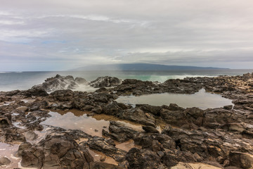 Fototapeta na wymiar Ocean Waves Crashing the Maui Coast