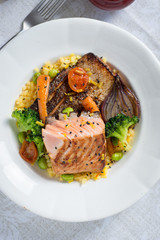 Grilled Salmon Steak with Vegetables on White Plate. Healthy Food.