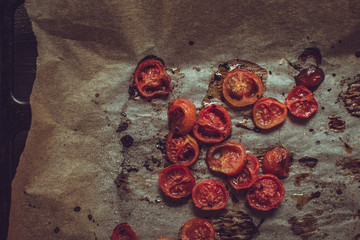 Roasted Cherry Tomatoes on Parchment. Rustic Style.