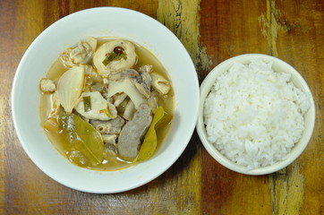 boiled spicy pork entrails in Tom Yum soup on bowl eat couple with plain rice