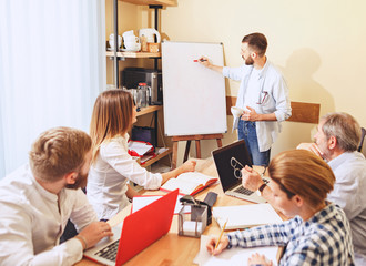 Obraz premium Team job. Photo young businessmans working with new project in office