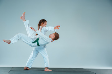 The boy fighting at Aikido training in martial arts school. Healthy lifestyle and sports concept © master1305