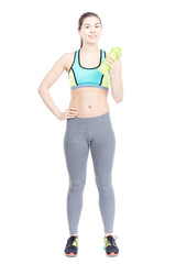Portrait of slim girl in sports clothes holding water bottle on white background