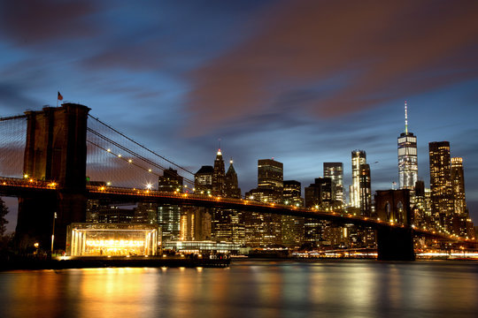 Fototapeta New York City Manhattan Downtown with Brooklyn Bridge at dusk