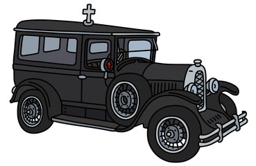 The vintage black funeral car