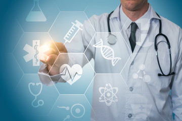 Doctor touches a virtual screen with medical icons. Healthcare hospital concept