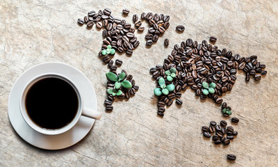 map of continents from coffee beans on a wooden background