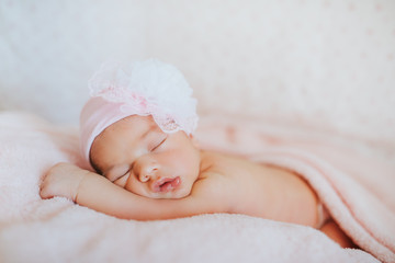 newborn sleeping baby , close-up, lifestyle, the concept of purity and innocence.