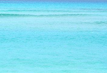 Background of a bright turquoise sea water