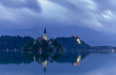 Amazing View On Bled Lake, Island,Church  With Mountain Range (Stol, Vrtaca, Begunjscica). Bled,Slovenia,Europe 