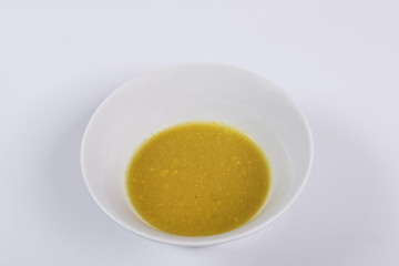 Creamy broccoli soup on a white
