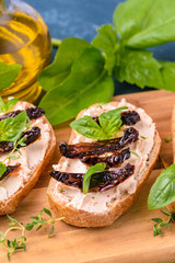 Bruschetta with cream cheese and dried tomato