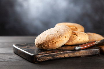 Homemade buns on dark background