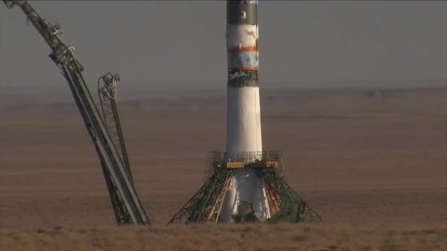 Tilt up, rocket launches in desert