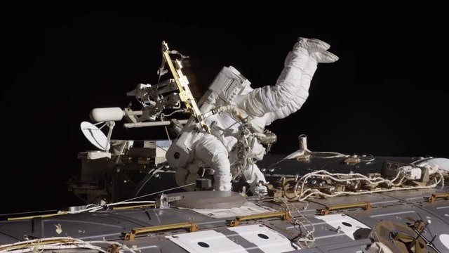 Astronaut on outside of International Space Station