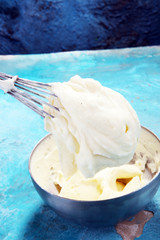 close up of a white whipped or sour cream in bowl.