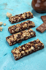 Granola bar. Healthy sweet dessert snack. Cereal granola bar with nuts and chocolate.