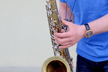 Boy playing the saxophone