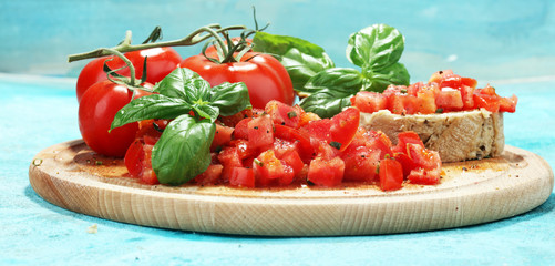 fresh tomato bruschetta. italian food appetizer with basil