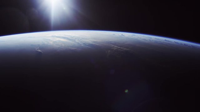 Wide, sun rises over Earth