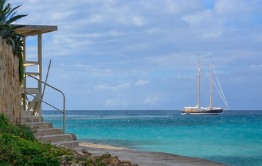 Sailboat on azure seas