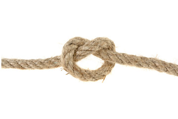 wicker rope tied in knot against white background