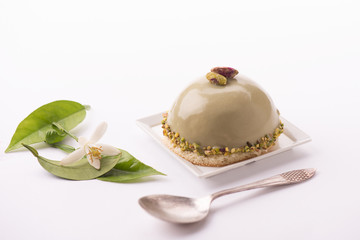 Obraz na płótnie Canvas Dessert with pistachio isolated on white background