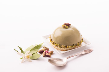 Dessert with pistachio isolated on white background