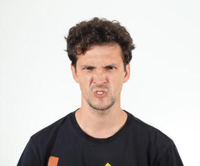 Obraz premium Wry face of young man