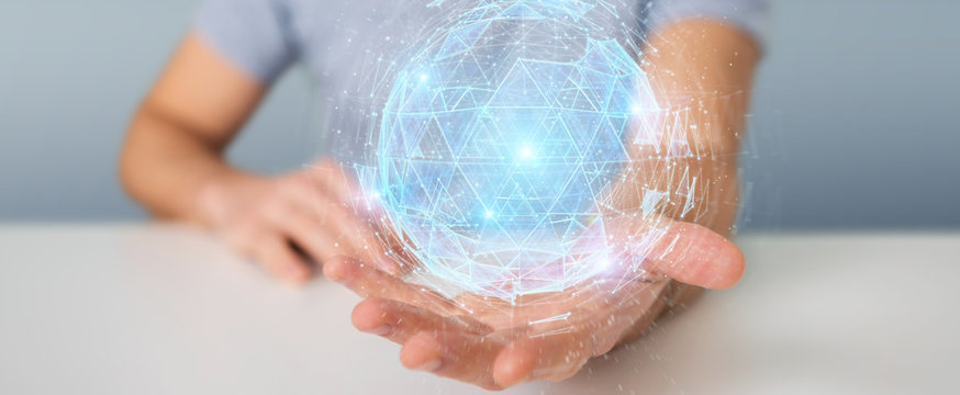 Businessman using digital triangle exploding sphere hologram 3D rendering