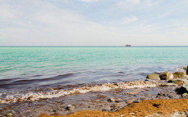 a cruise ship on turquoise ocean