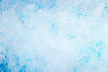 blue watercolor painted on paper background texture