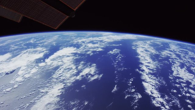 Wide, International Space Station flies over Earth atmosphere