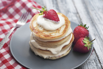 Sweet Pancakes with Cream and Strawbery. Health Breakfast Fruit Berry Vitamine Gray Rustic Wooden Background