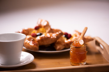 Breakfast on a bed in a hotel room. Bedroom, meal.