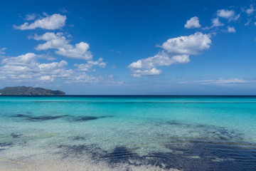 Fototapeta na wymiar Mallorca, Blue sky over perfect clear water of spanish holiday island sand beach
