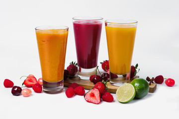 Three glasses with fruit smoothies