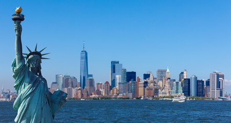 The statue of Liberty with World Trade Center background