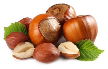 hazelnuts with leaves isolated on white background. macro