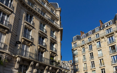 The traditional facades of Parisian buildings, France.