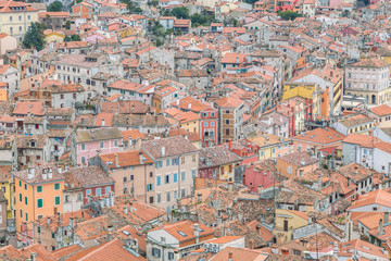 Fototapeta na wymiar Aerial view on houses with red roofs of the historic center of Rovinj town in Croatia, Europe.