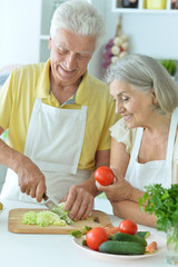 family in the kitchen preparing