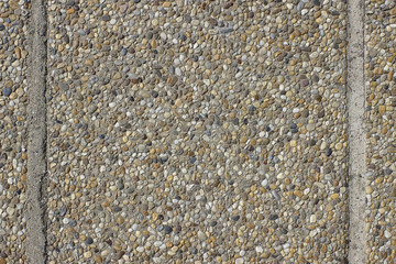 Gravel shingle tile sidewalk background or texture.