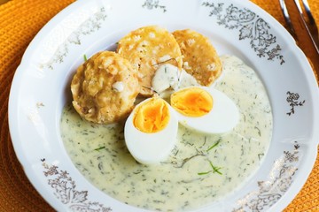 Dill sauce, boiled egg and dumpling, Czech republic meal.