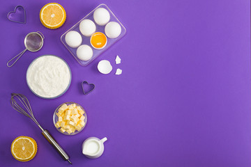 Baking flat lay background with eggs floor butter lemon muffins