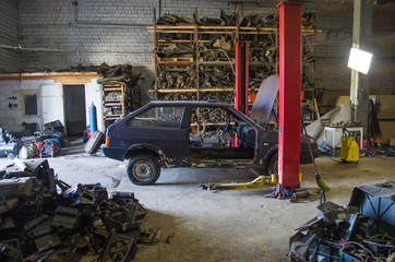 Fototapeta premium dismantled car, spare parts