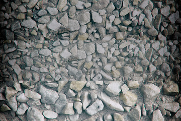 Pebble textured surface, stone backdrop and boulder background